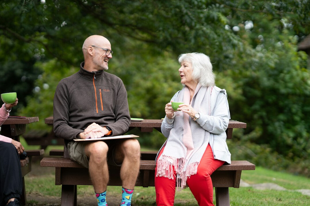retired couple discussing finances