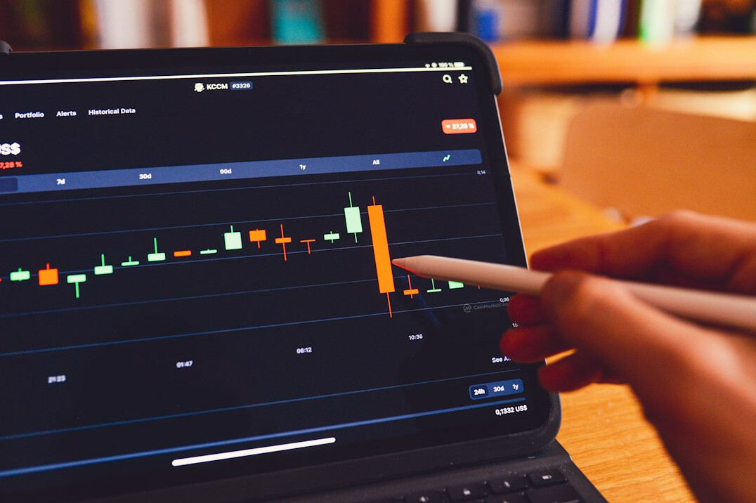 investor analyzing stock charts