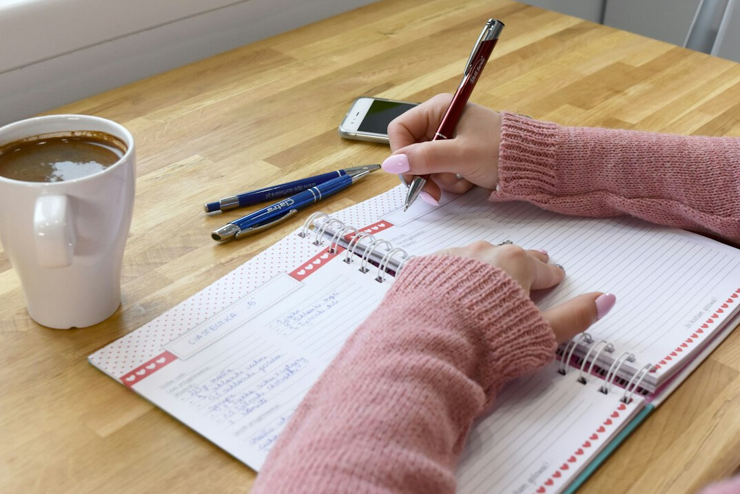 person calculating budget at home